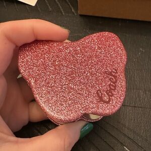 Glittery pink Coach compact mirror